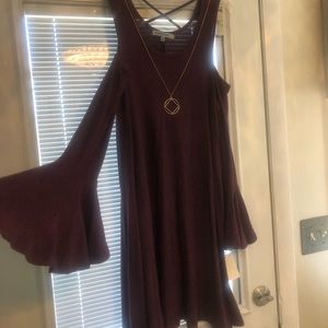 Cold shoulder dress with chain necklace